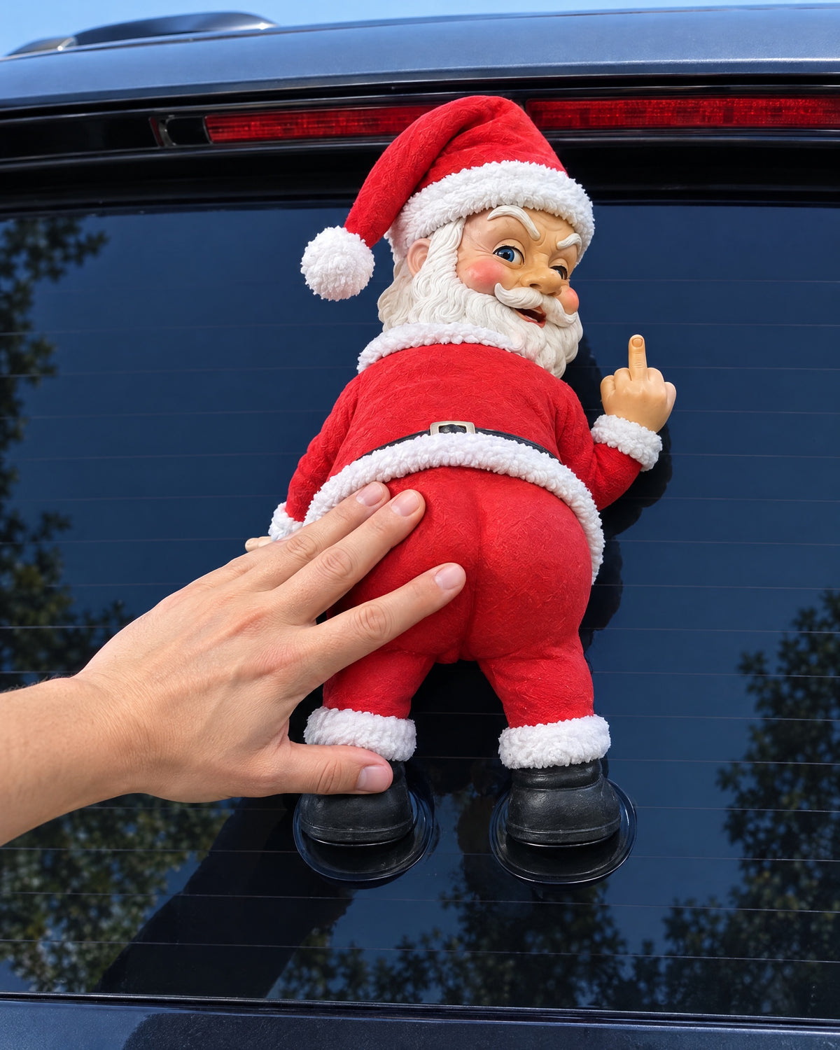 Pressing Santa Spray onto a rear window